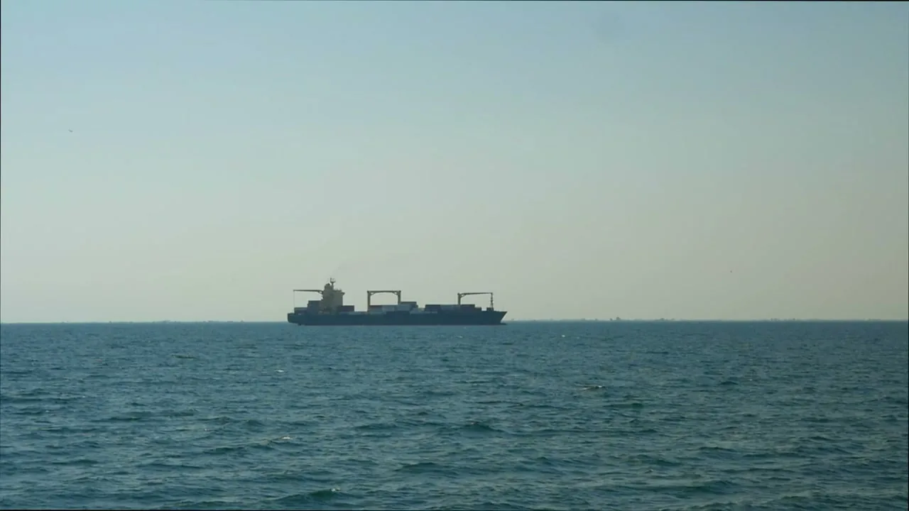 Container ship sailing on the open sea