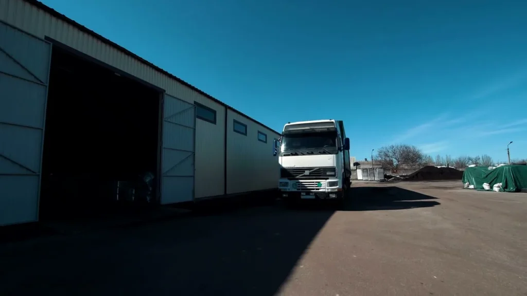 HGV lorry parked in a warehouse yard