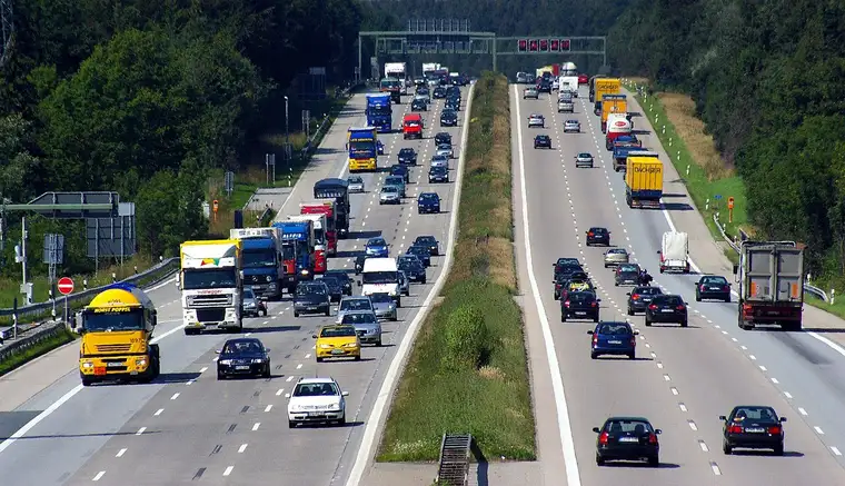 Lorries and traffic on the A8 Autobahn near Holzkirchen, Germany